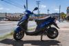 blue_moped_side_view_moped_rental_company.jpg