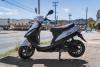 silver_moped_side_view_moped_rental_company.jpg